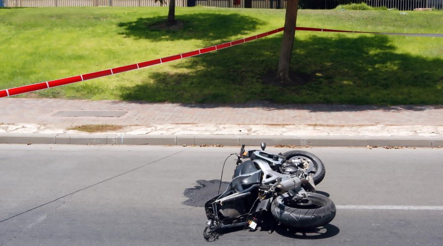 Can a motorcyclist who wasn’t wearing a helmet at the time of the accident still pursue an accident claim to seek compensation for injuries in North Carolina?