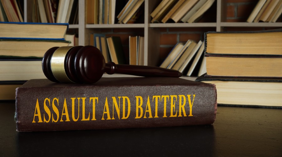 What is the difference between assault and battery charges in North Carolina?