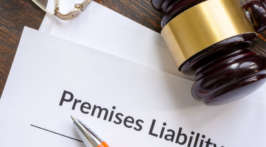 Who is responsible for an injury in a premises liability case in Greensboro, North Carolina?